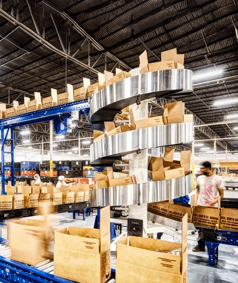 Manufacturing company boxing the meals on a manufacturing line